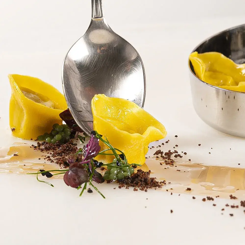 Ravioli all'olio e branzino